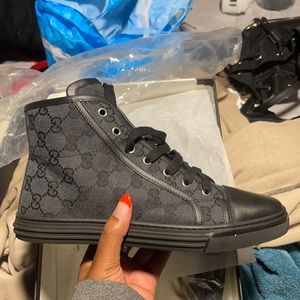 Brand new black Gucci high top sneakers